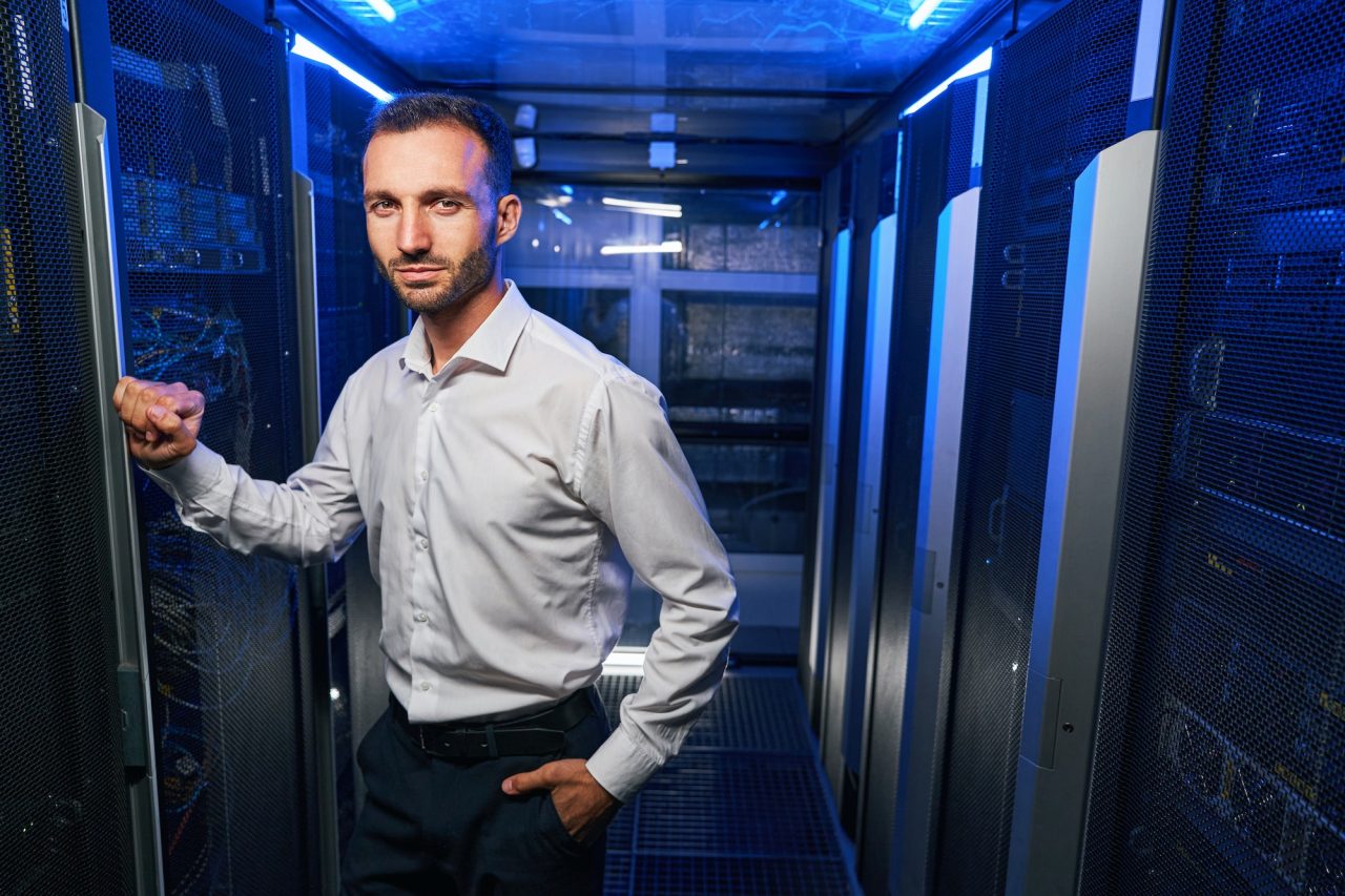 IT specialist managing data center equipment